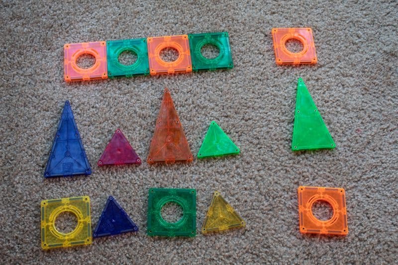 Magnetic tiles in patterns of color, shape and size.